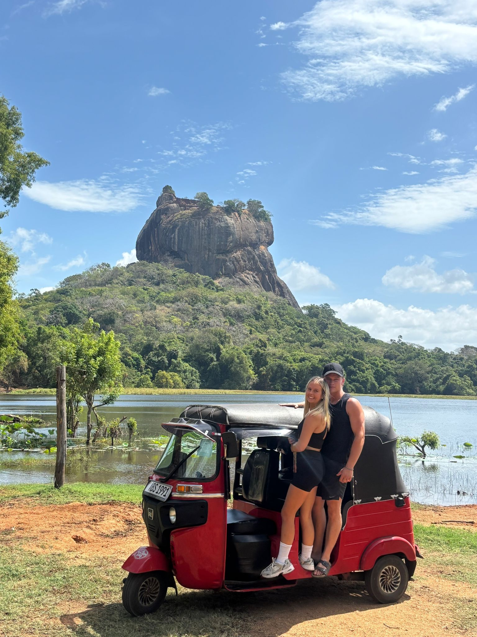 Regular Bajaj tuk tuk for $7 USD per day - most affordable self-drive option for tourists in Sri Lanka